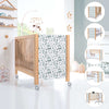 Cot 60x120 cm in wood with eucalyptus leaf sticker on headboard · Ombra Musgo