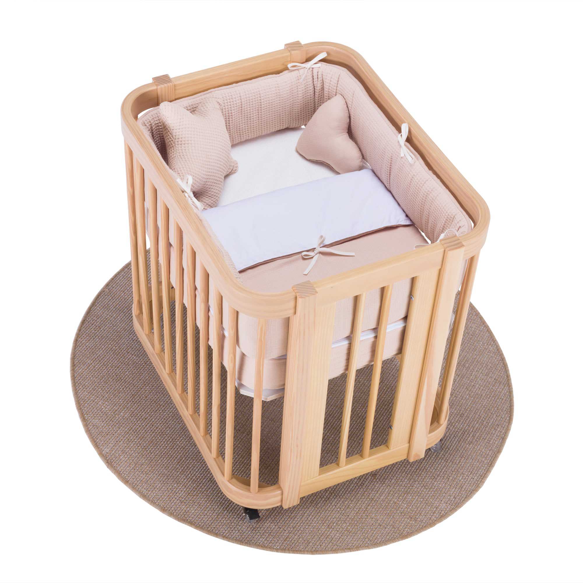 Oval baby crib 55x70cm in wooden colour