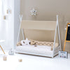 Withe Montessori bed 70x140 cm with beige bedding · Homy